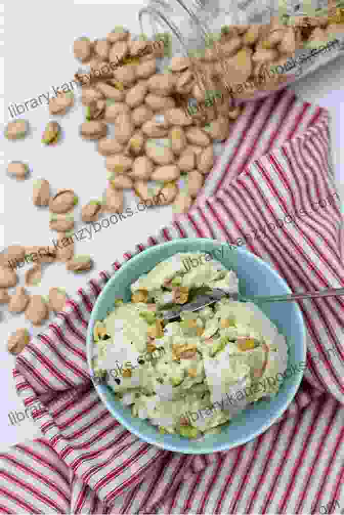 A Generous Scoop Of Pistachio Frozen Yogurt, Garnished With Chopped Pistachios And A Drizzle Of Honey. Delicious Frozen Yogurt Recipes: Homemade Frozen Yogurt: Frozen Yogurt