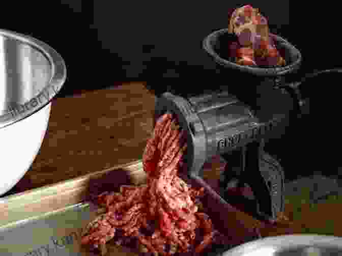 A Person Grinding Meat Using A Meat Grinder Oh 1001 Homemade Sausage Recipes: Make Cooking At Home Easier With Homemade Sausage Cookbook