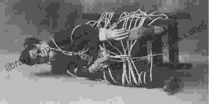 A Photograph Of Harry Houdini Performing A Famous Escape Act Harry Potter: A History Of Magic: The EBook Of The Exhibition