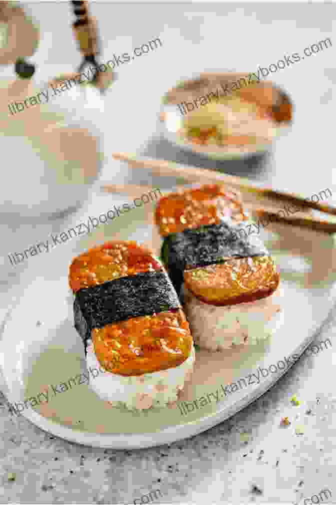 A Savory Spam Musubi Consisting Of Grilled Spam Topped With Rice And Wrapped In Seaweed FAVORITE RECIPE S FROM HAWAII: Experience The Many Foods Of Hawaii