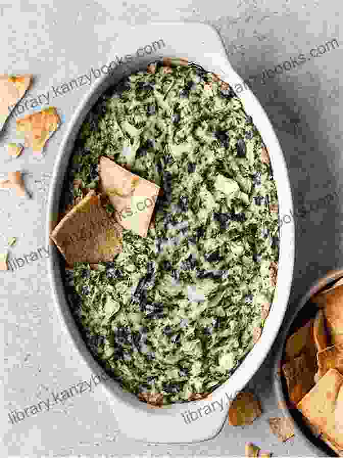 Creamy Spinach Artichoke Dip In A White Bowl Copycat Appetizers Cookbook Volume 1: Recipes From Your Favorite Restaurants (Copycat Cookbooks)